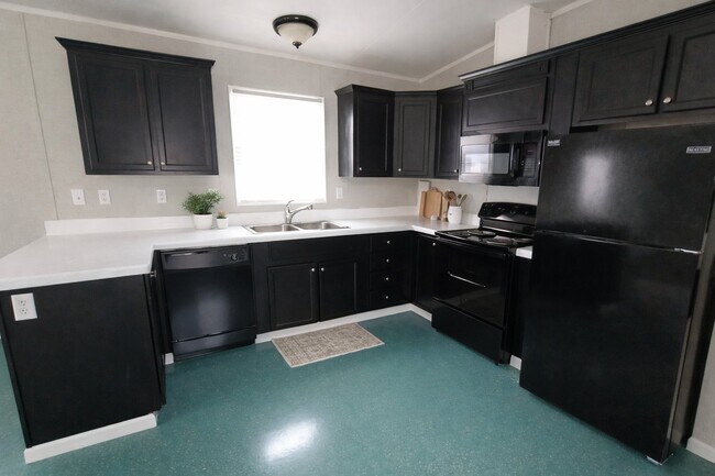 Foto del edificio - 9 Deerwood Park