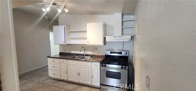 Foto del edificio - 6963 Tamarisk Ave