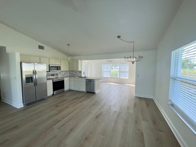 Living/Dining/Kitchen Area - 7399 SE Flamingo Way