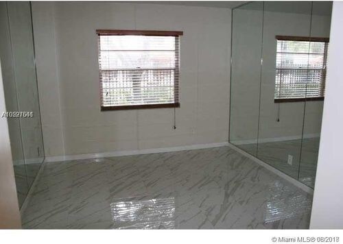 Building Photo - 8800 Royal Palm Blvd