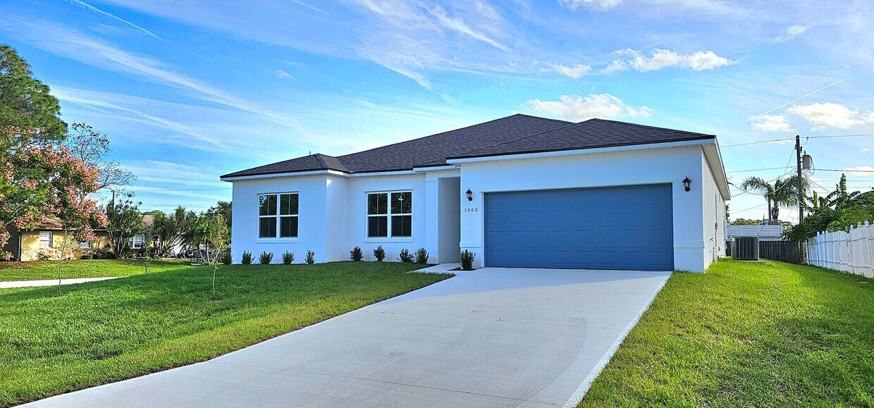 Primary Photo - NW Palm Bay 4-Bedroom, 3-Bath Corner Lot.