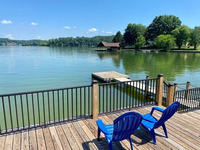 Building Photo - Lakefront Luxury Awaits: Modern 2BR with Private Dock & Pool