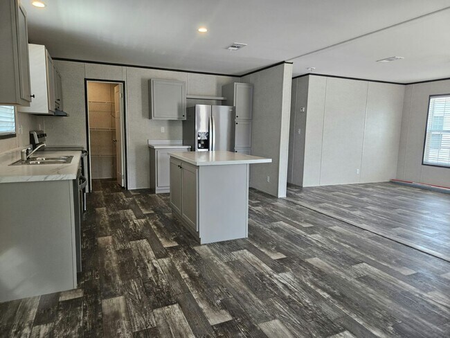 Foto del edificio - 6671 Hidden Oaks Dr