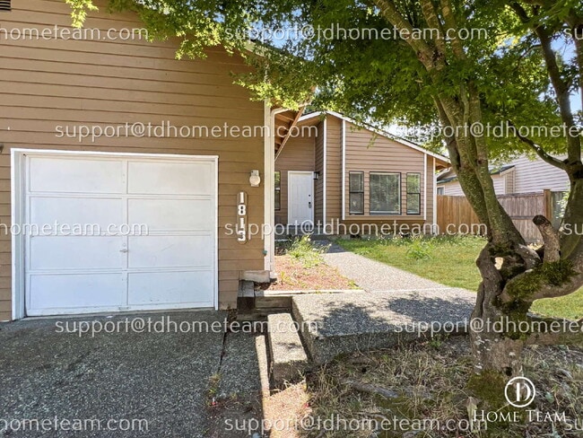 Building Photo - "Charming 3-Bedroom Retreat with Cozy Fire...