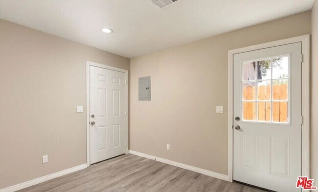 Building Photo - 9219 Langdon Ave