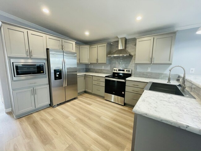 Foto del edificio - 4974 Coopers Hawk Pl