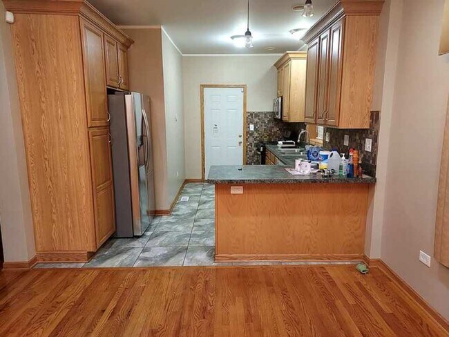 Foto del edificio - 8233 S Langley Ave