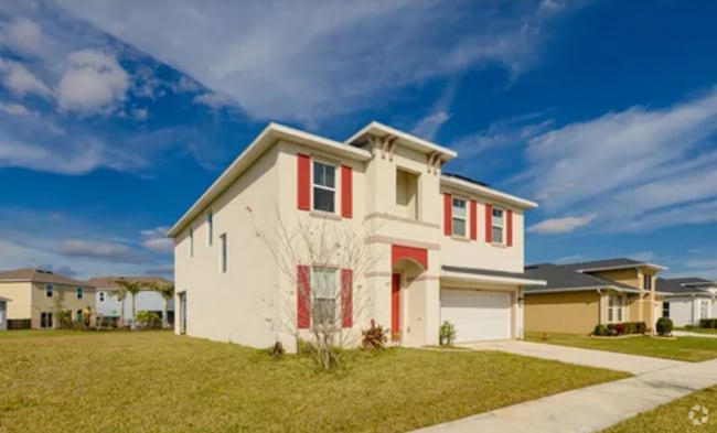 Building Photo - 10976 SW Tessili Way