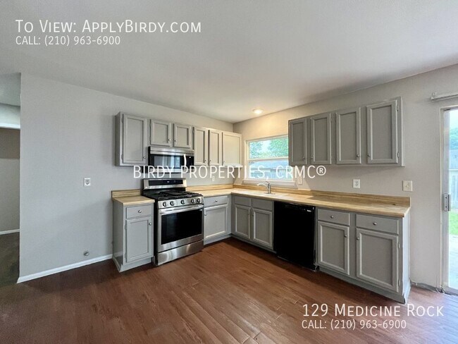 Building Photo - Charming 3-Bedroom Home with Fireplace in ...