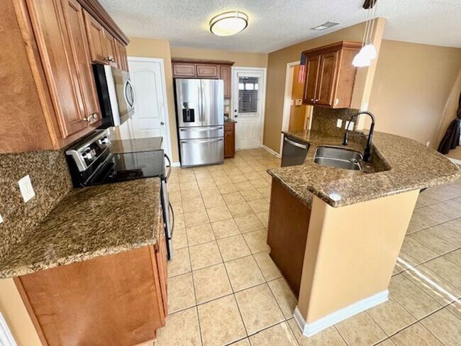 Foto del edificio - Now leasing a 4-bedroom 2.5 bath home in Arlington. Great location and great schools!