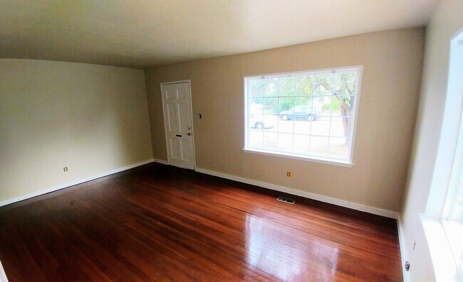 Building Photo - Bright two bedroom Home with a Covered Back Deck