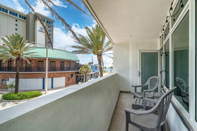 Building Photo - The Purple Pelican~Beachfront w/ Ocean Bal...