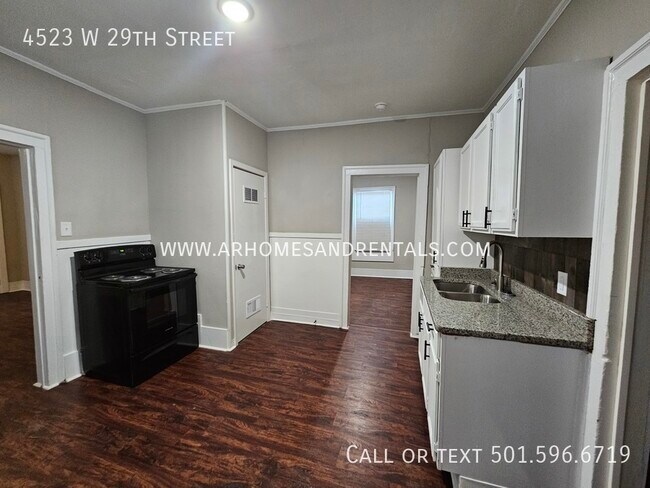 Building Photo - 4523 W 29th Street | $995 | 3 beds, 1 full...