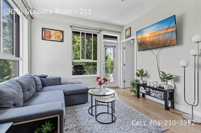 Building Photo - Bright Corner Condo with 2 Parking