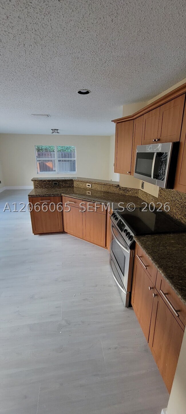 Building Photo - 5280 NW 113th Pl