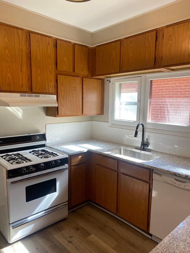 New granite and subway tile. - 395 N Emerson St