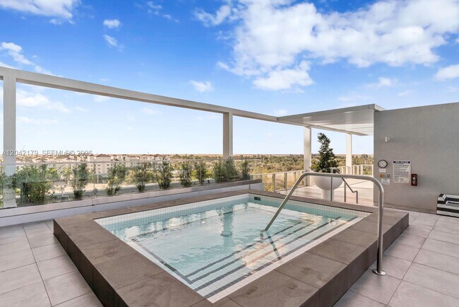 Building Photo - Metropica Way, Sunrise, FL 33323 - 2 BR 2.5 BA condo