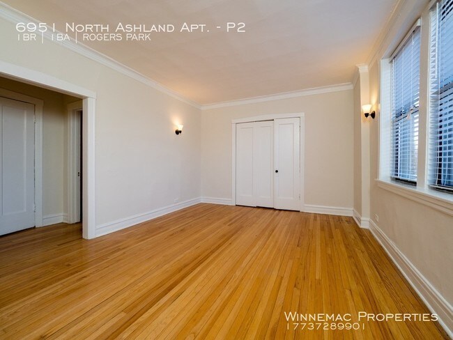 Building Photo - 6951 N Ashland Blvd
