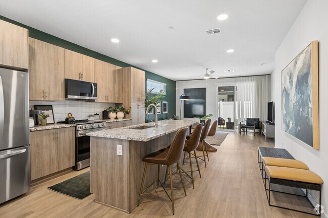 2BR, 2BA - 1,088SF - Kitchen/Living Room - Elux at McQueen