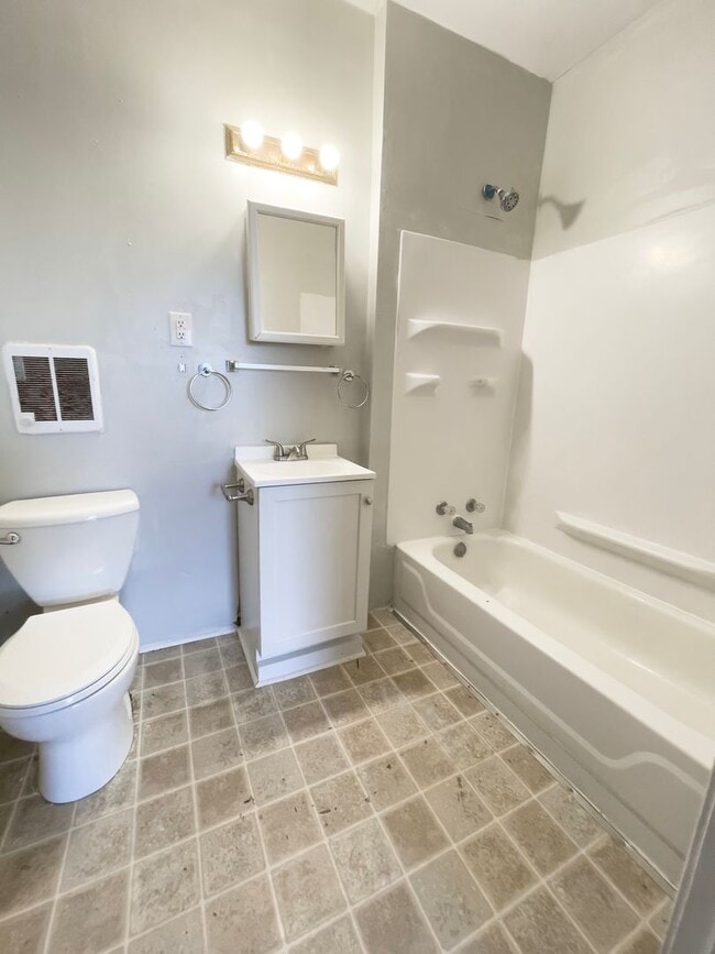 Building Photo - Downtown Home with fence and nice updates and clawfoot tub