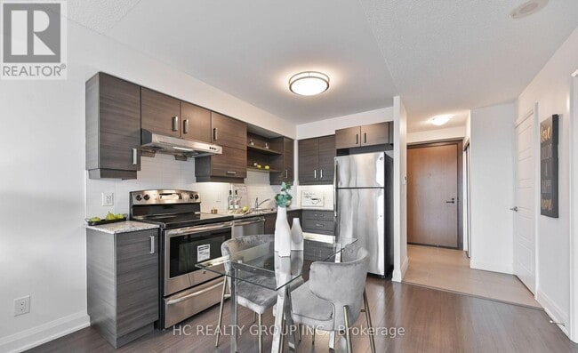 Photo du bâtiment - 1 Uptown Dr