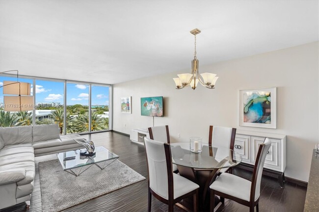 Building Photo - 10275 Collins Ave