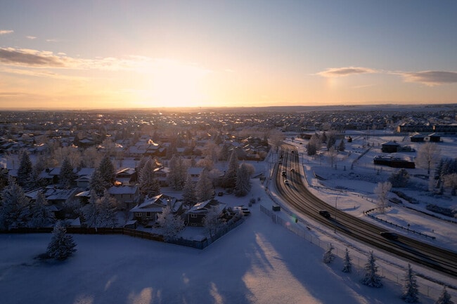 Aerial sunset view of snowy Airdrie, Alberta.