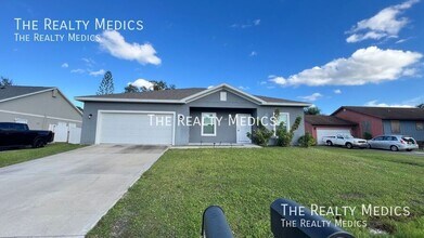 Building Photo - 1067 Sheridan Ave NW