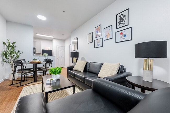 24-Longview-Apartments-Near-UT-Austin-Furnished-Living-Room-and-Dining-Area - 24 Longview