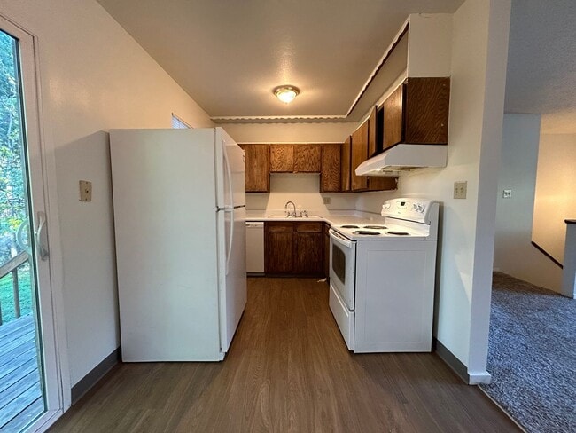 Building Photo - Beautiful Split-Level 6BR Home with Attached Garage and Fenced Yard +$300 Off First Month!