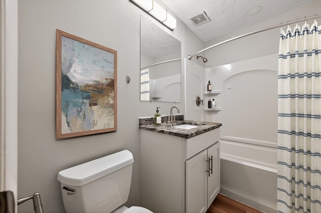 Elevate your living experience at Park Village West with this stylish bathroom featuring modern fixtures and serene decor. Enjoy the perfect blend of comfort and functionality. Schedule a tour today to see it in person! - Park Village West