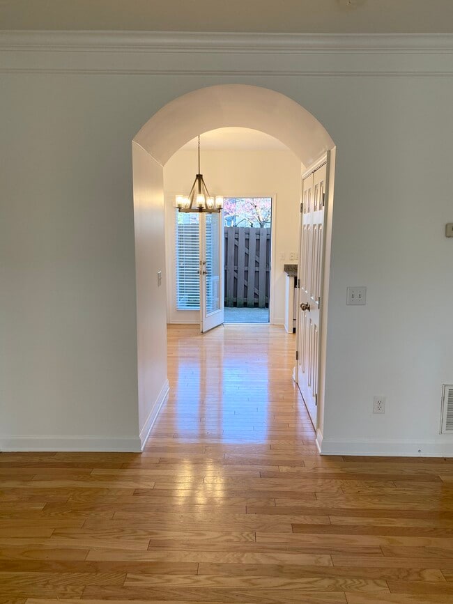 Beautiful view from your living room into kitchen and patio. - 809 Benton Ave