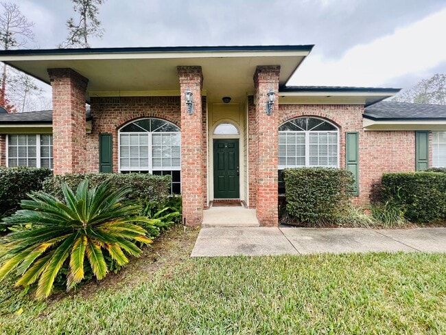 Building Photo - Behind the Gates: A Corner-Lot 4 bedroom, 2 bath Retreat in Coveted Pace Island!!