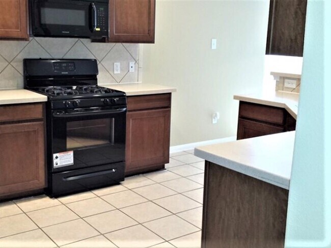 Foto del edificio - 15742 Flagstone Walk Way