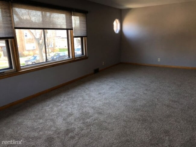 Building Photo - 3876 E Layton Ave