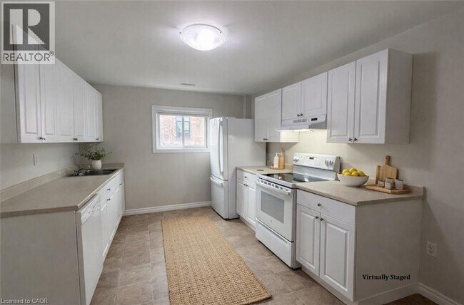 Photo du bâtiment - 3 King St E