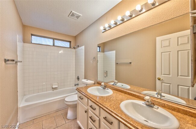 Foto del edificio - 8997 Living Rose St