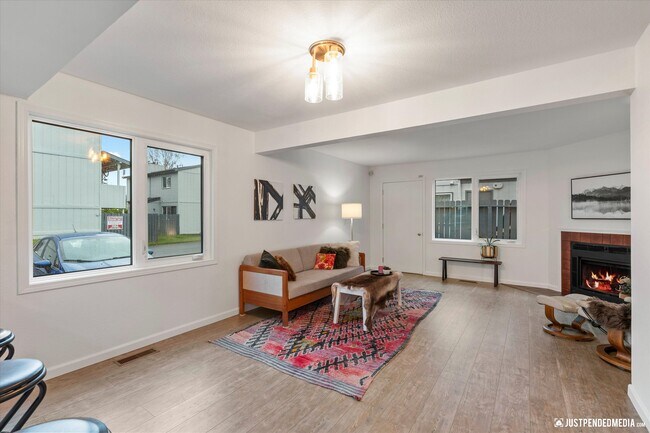 Living Room with Door to Deck - 4075 E 20th Ave