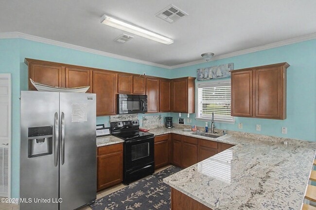 Building Photo - 1515 E Beach Blvd