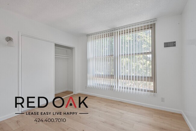 Foto del edificio - 8619 Belford Ave