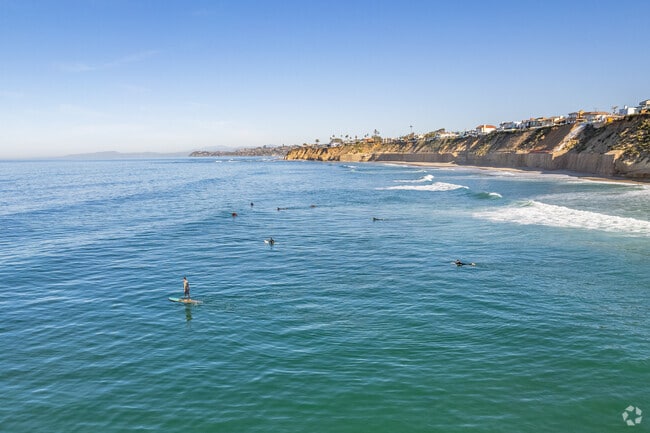 Surfers are always riding the waves near Fletcher Cove in Solana Beach.