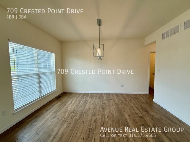 Building Photo - 709 Crested Pt Dr