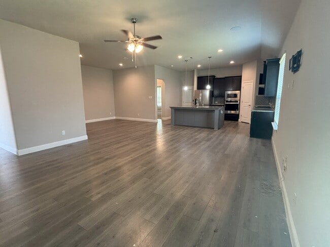 Great Room and Formal Dining Room - 702 Audrey Ln
