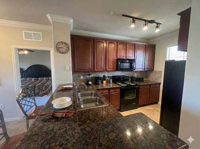 Building Photo - Spacious 3 bedroom Condo with Resort-Style Living!