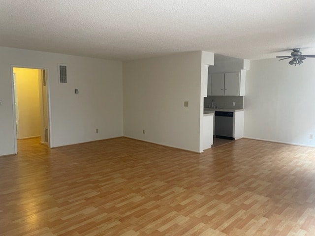 Wider view of living/dining and hallway - 1044 9th St