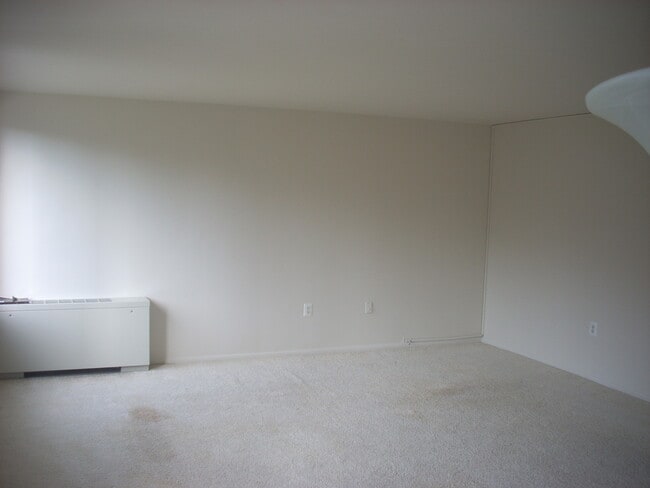 Building Photo - A renovated efficiency located on the four...
