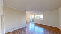 Embrace the lifestyle you've always dreamed of in this exquisite 2-bedroom, 2-bathroom haven in Castro Valley. This 810 square foot masterpiece is a testament to modern elegance and thoughtful design. As you step inside, you're greeted by stunning hardwood floors that flow seamlessly through the main living areas, creating a warm and inviting atmosphere.

The heart of this home is the bright and airy living room, where natural light pours in through large windows, illuminating your daily life and creating the perfect space for relaxation or entertaining. Adjacent, you'll find a charming dining area, ideal for intimate dinners or lively gatherings with friends and family.

The kitchen is a culinary enthusiast's delight, featuring sleek white cabinetry, modern appliances, and ample counter space. Whether you're whipping up a quick breakfast or preparing a gourmet meal, this space is designed to inspire your inner chef.

Retreat to the luxurious primary bedroom, a generous 170 square feet of personal sanctuary. With plush carpeting underfoot and plenty of room for a king-sized bed, this space offers the ultimate in comfort and relaxation. The second bedroom, equally inviting, provides versatility as a guest room, home office, or whatever suits your lifestyle.

Both bathrooms are tastefully appointed, featuring contemporary fixtures and finishes. The main bathroom boasts a bathtub perfect for long, relaxing soaks, while the second ensures convenience for you and your guests.

This home is more than just a place to live; it's an opportunity to create the life you've always imagined. With its prime location in Castro Valley, you're just moments away from excellent schools, shopping, dining, and outdoor recreation. Don't miss your chance to make this dream a reality – schedule your viewing today!