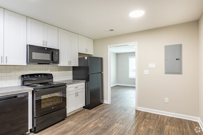 2BR, 1BA - Cocina/comedor de 900SF2 - Langley Place