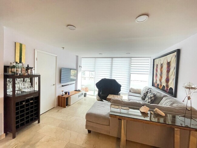 Building Photo - 8911 Collins Ave
