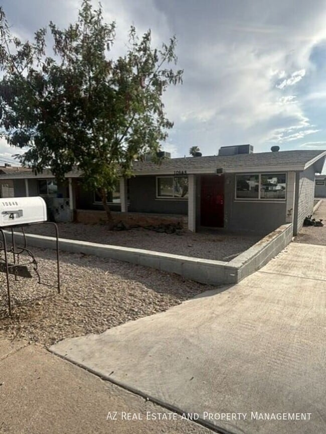 Building Photo - 10648 N 15th Ave
